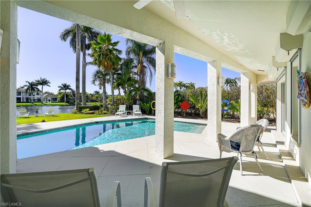 536 Turtle Hatch Road Naples, FL 34103 - Photo 17 of 28 Swimming pool with a patio area