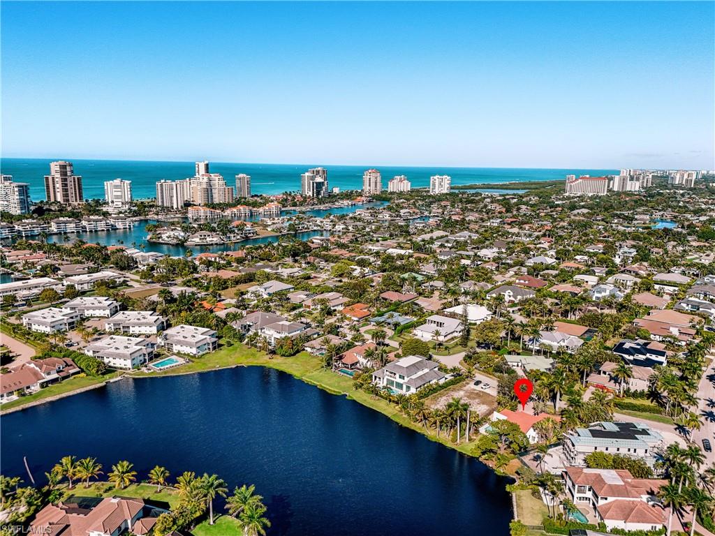 536 Turtle Hatch Road Naples, FL 34103 - Photo 26 of 28 View of urban area featuring a large body of water and nearby suburban area
