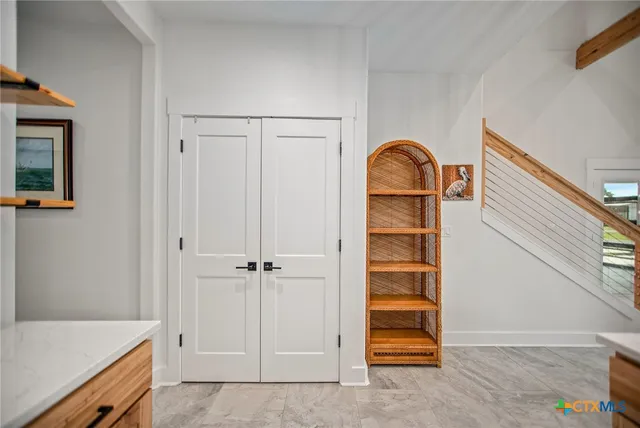 a view of entryway with wooden floor