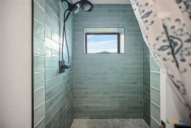 a bathroom with a window