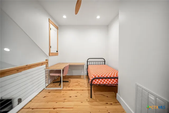 a balcony with seating area