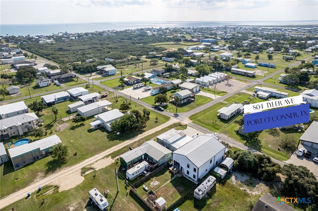 804 Tyler Avenue Port O'Connor, TX 77982 - Photo 5 of 43 an aerial view of a house with a lake