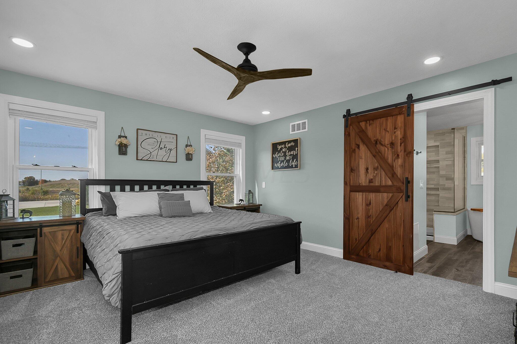 3620 Hyatts Road Powell, OH 43065 - Photo 20 of 54 Owner suite with new remodeled bathroom with barn door and new recessed lighting.