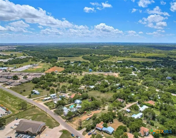 a view of a city with an ocean