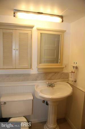 430 M Street Southwest, Unit N810 Washington, DC 20024 - Photo 10 of 18 a bathroom with a sink and a mirror
