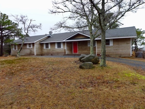 71 Bartimus Luce Road West Tisbury, MA 02568 - Photo 7 of 8 a front view of a house with garden
