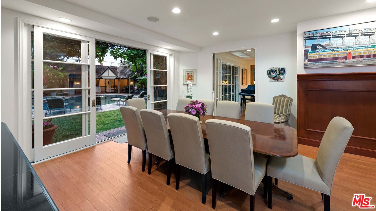 620 North Crescent Drive Beverly Hills, CA 90210 - Photo 11 of 23 a view of a dining room with furniture window and wooden floor