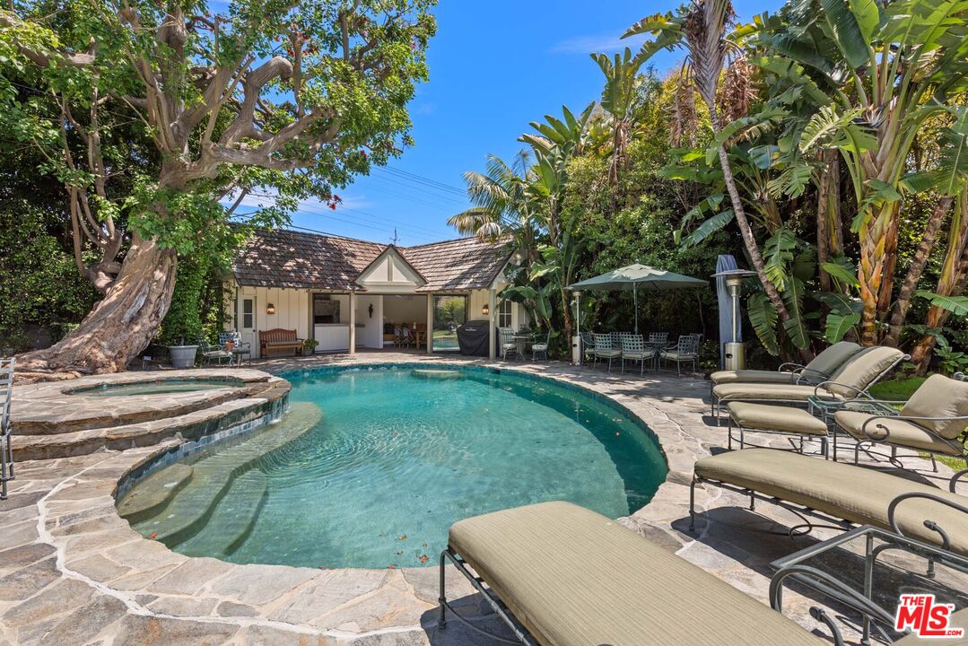 620 North Crescent Drive Beverly Hills, CA 90210 - Photo 13 of 23 a view of a house with backyard porch and sitting area