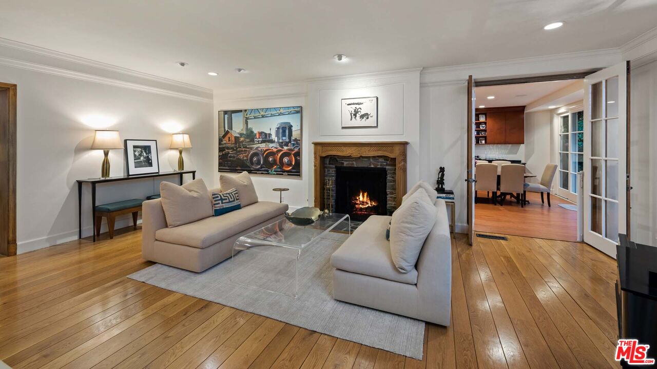 620 North Crescent Drive Beverly Hills, CA 90210 - Photo 5 of 23 a living room with furniture and a fireplace