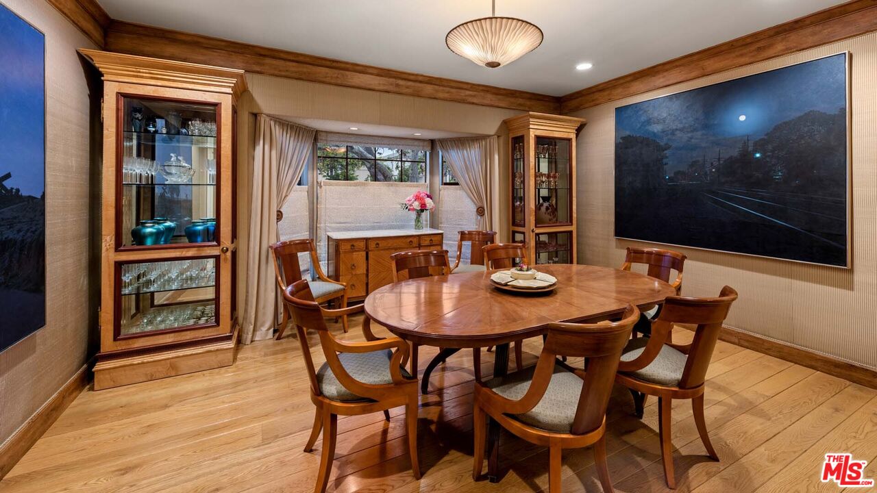 620 North Crescent Drive Beverly Hills, CA 90210 - Photo 8 of 23 a view of a dining room with furniture and wooden floor