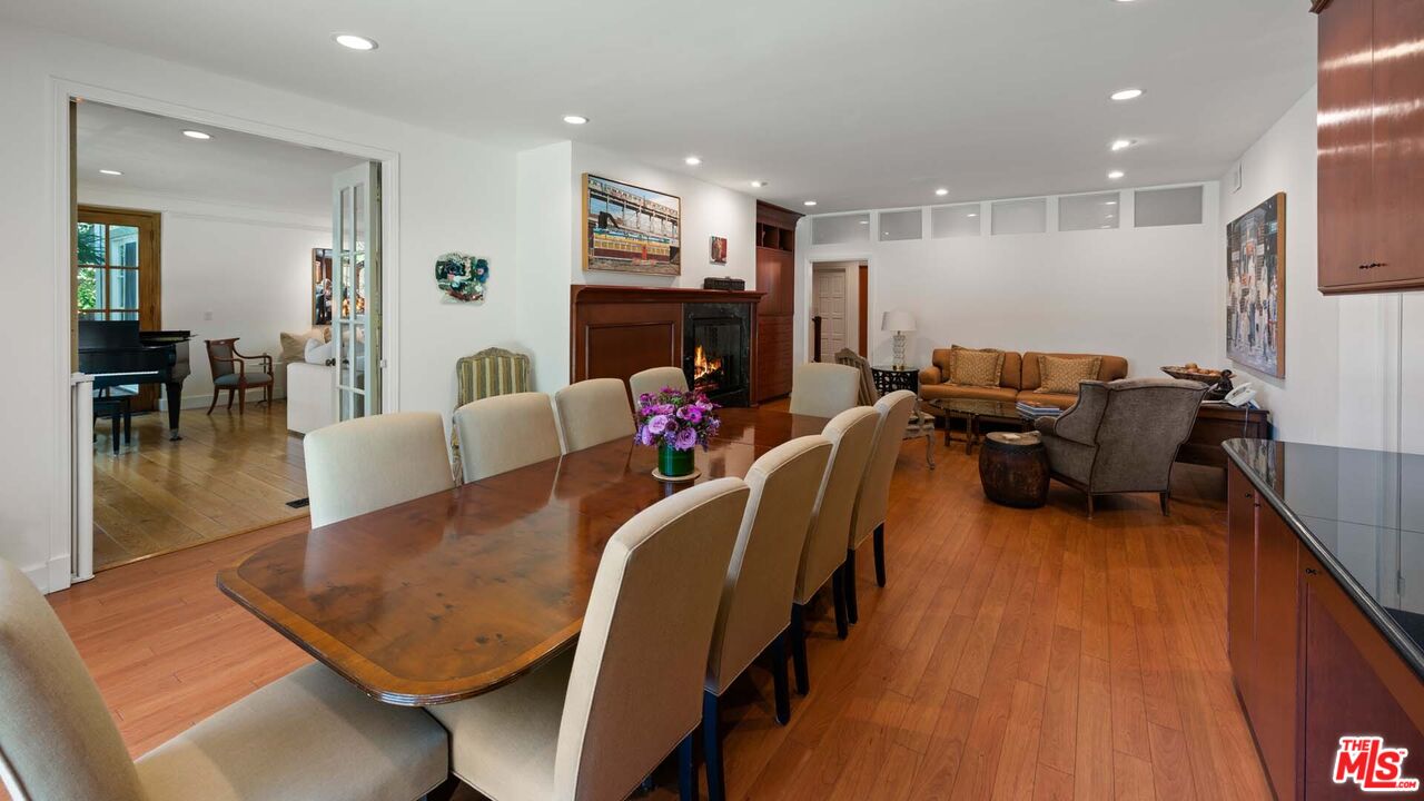 620 North Crescent Drive Beverly Hills, CA 90210 - Photo 10 of 23 a living room with furniture and a flat screen tv