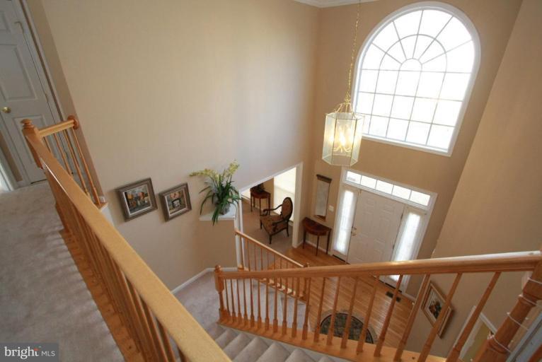 14418 Autumn Crest Road Boyds, MD 20841 - Photo 11 of 26 a view of an entryway with wooden floor
