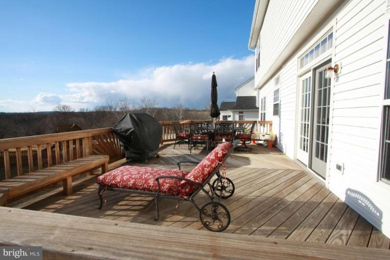 14418 Autumn Crest Road Boyds, MD 20841 - Photo 5 of 26 a view of a balcony with furniture