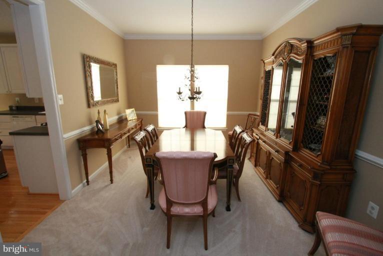 14418 Autumn Crest Road Boyds, MD 20841 - Photo 6 of 26 a dining room with furniture and window