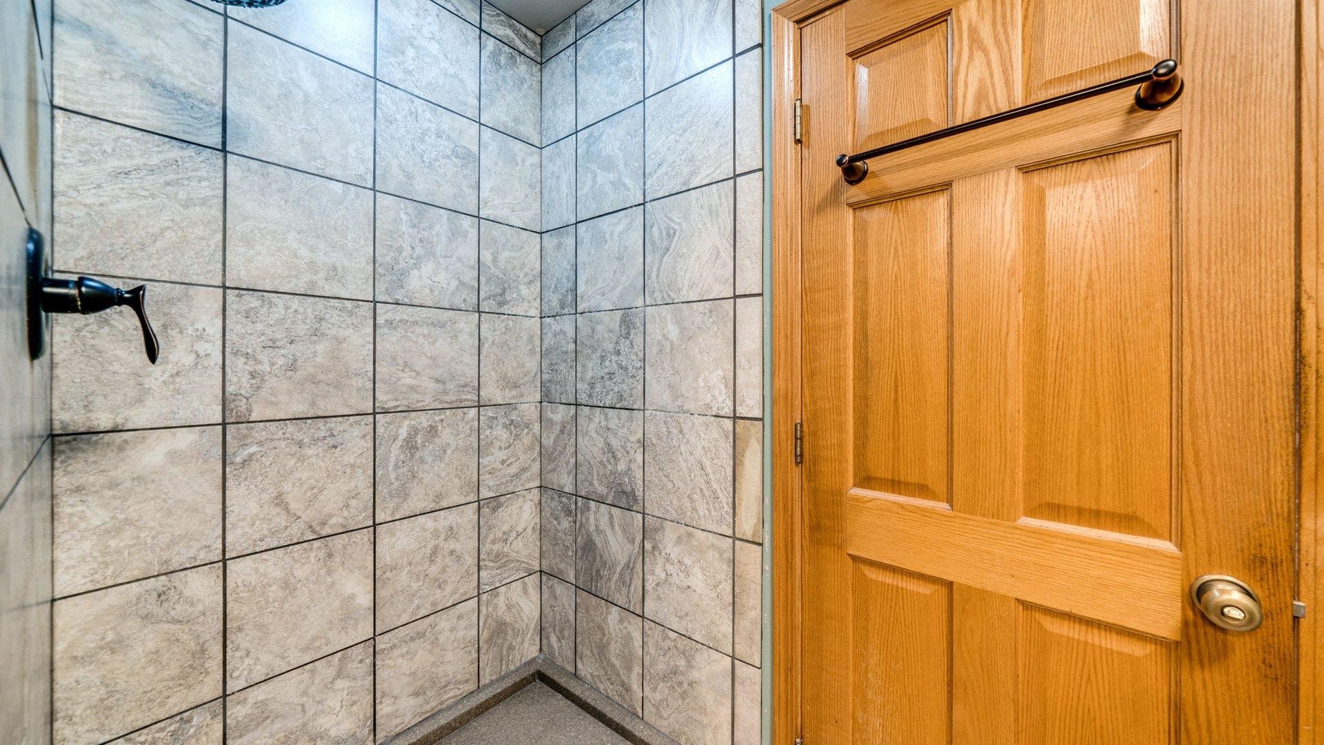 313 West Margaret Fuller Road Oregon, IL 61061 - Photo 19 of 46 a bathroom with a shower