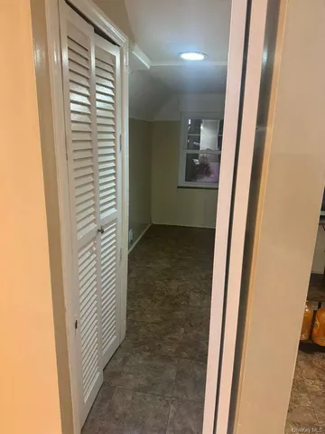 an entryway with a white door