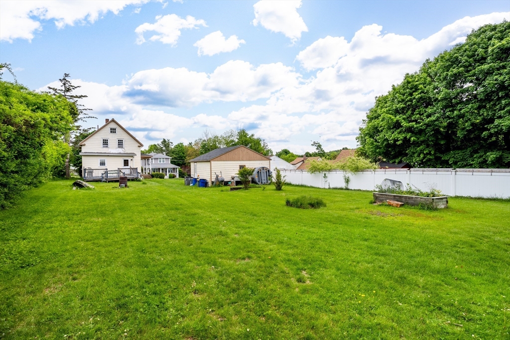 54 Charles Street Gardner, MA 01440 - Photo 40 of 40 a view of an house with backyard space and garden