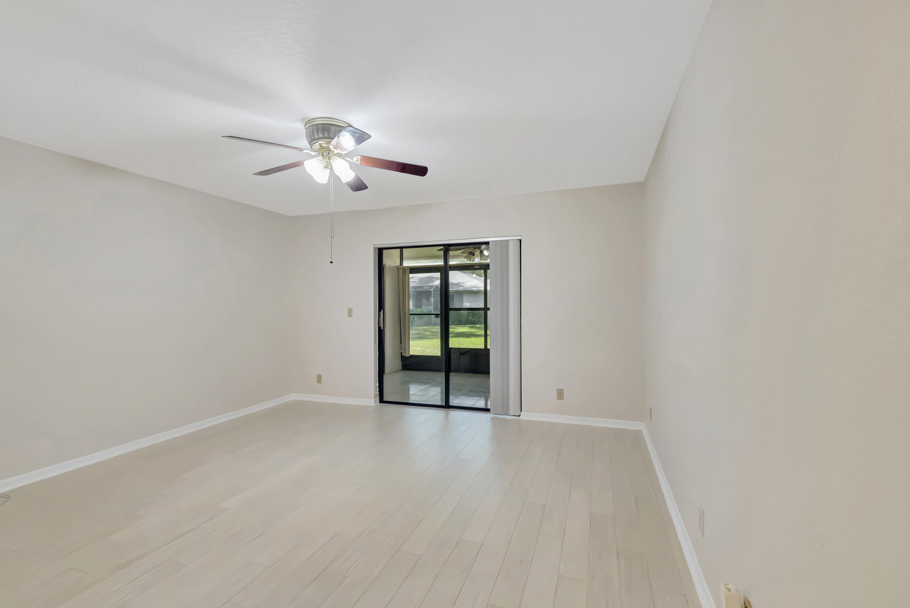 18559 Breezy Palm Way Boca Raton, FL 33496 - Photo 21 of 43 a view of an empty room with a window
