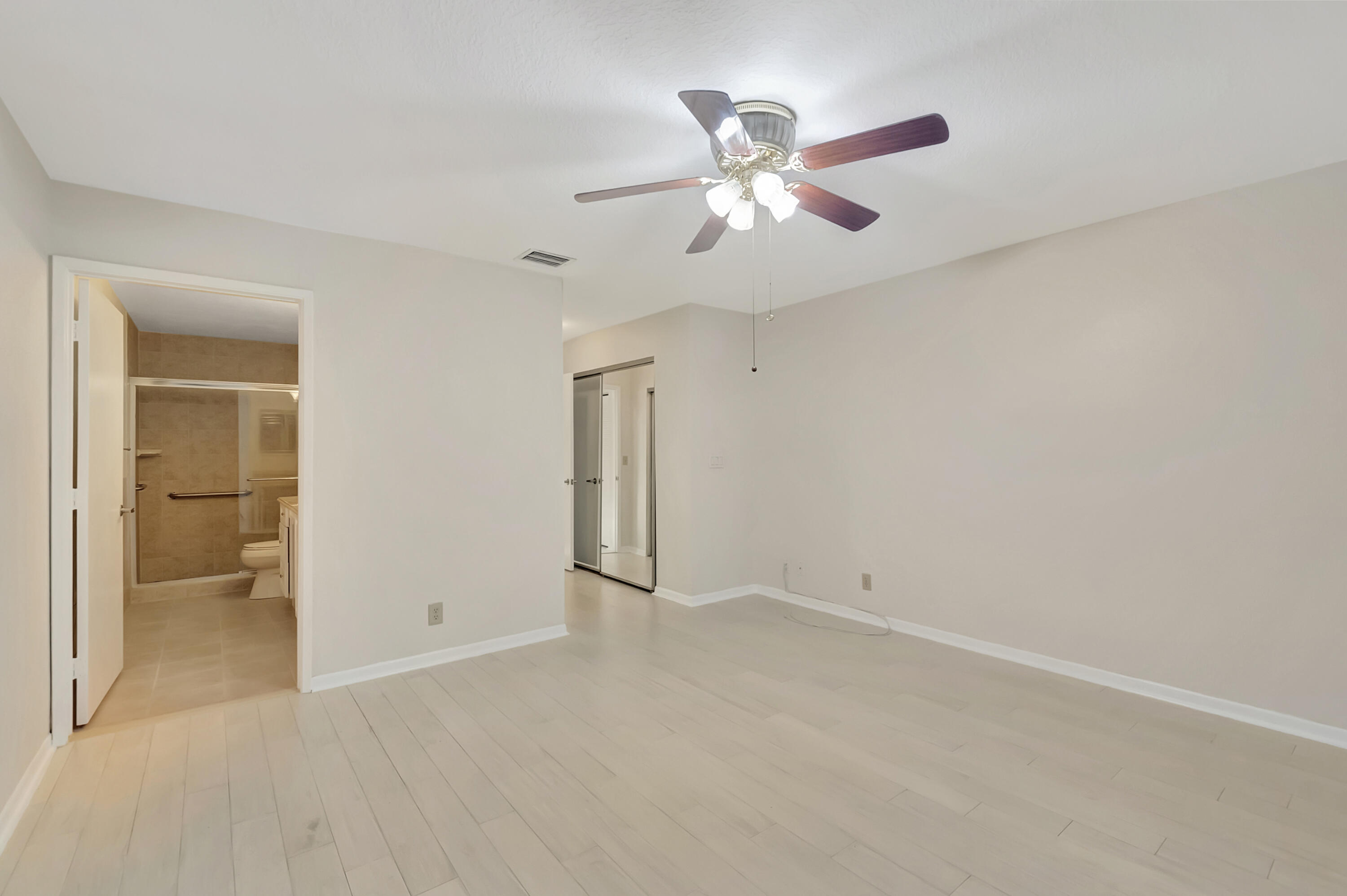 18559 Breezy Palm Way Boca Raton, FL 33496 - Photo 22 of 43 wooden floor in an empty room