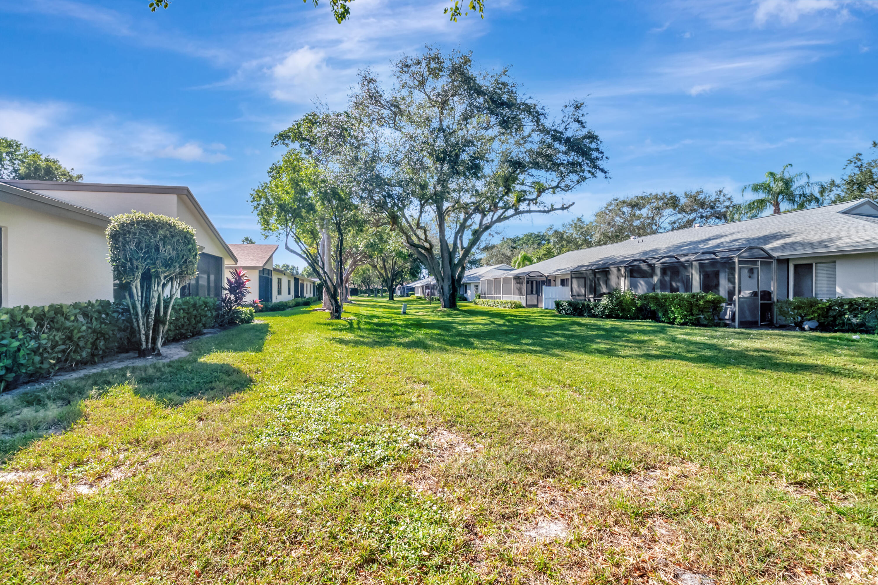 18559 Breezy Palm Way Boca Raton, FL 33496 - Photo 35 of 43 a view of a house with a big yard