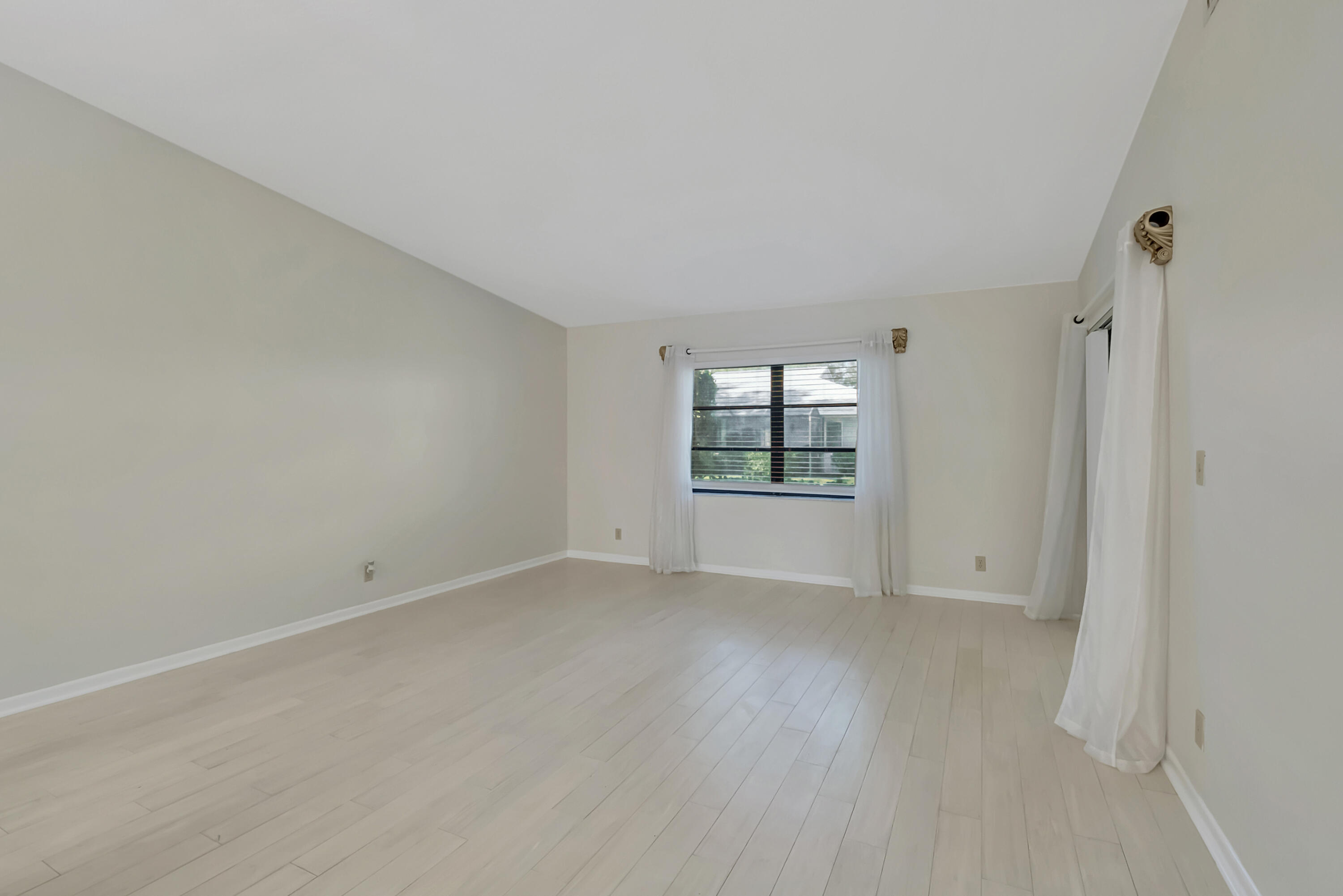 18559 Breezy Palm Way Boca Raton, FL 33496 - Photo 7 of 43 wooden floor in an empty room