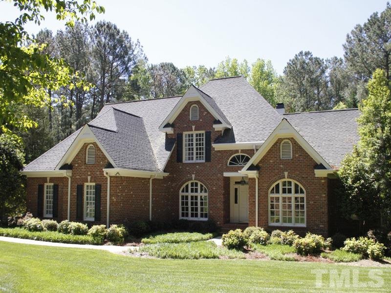 Welcome to this stunning custom brick beauty in the heart of North Raleigh. Nestled on over 2 acres with beautiful landscaping.