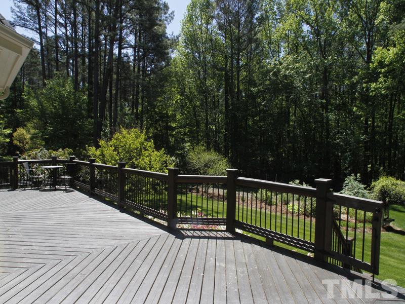 13921 Possum Track Road Raleigh, NC 27614 - Photo 2 of 25 Enjoy the picturesque setting while relaxing the day away on this expansive deck.