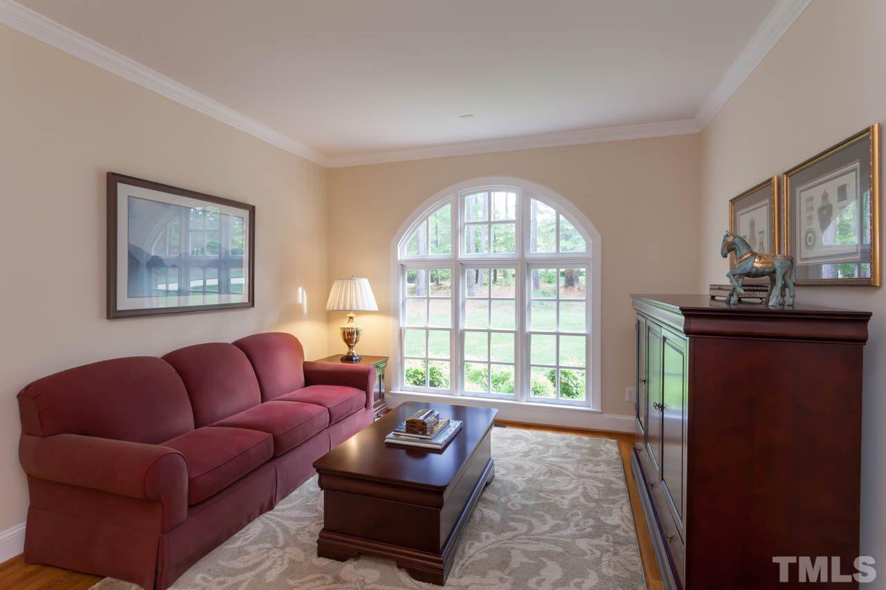 13921 Possum Track Road Raleigh, NC 27614 - Photo 8 of 25 Lovely Living Room with Large palladium windows allow the natural light to shine in.