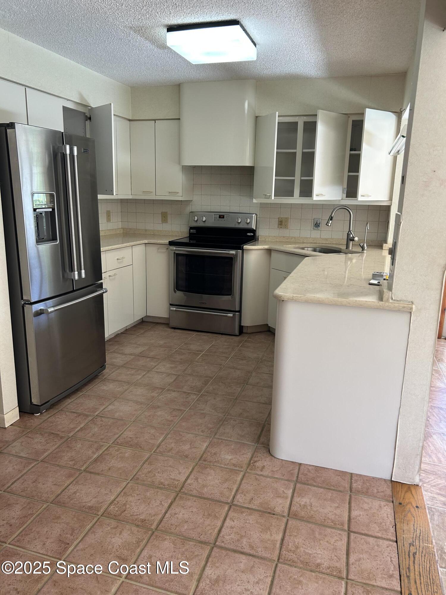 100 South Wimbrow Drive, Unit 15 Sebastian, FL 32958 - Photo 13 of 23 Jan kitchen