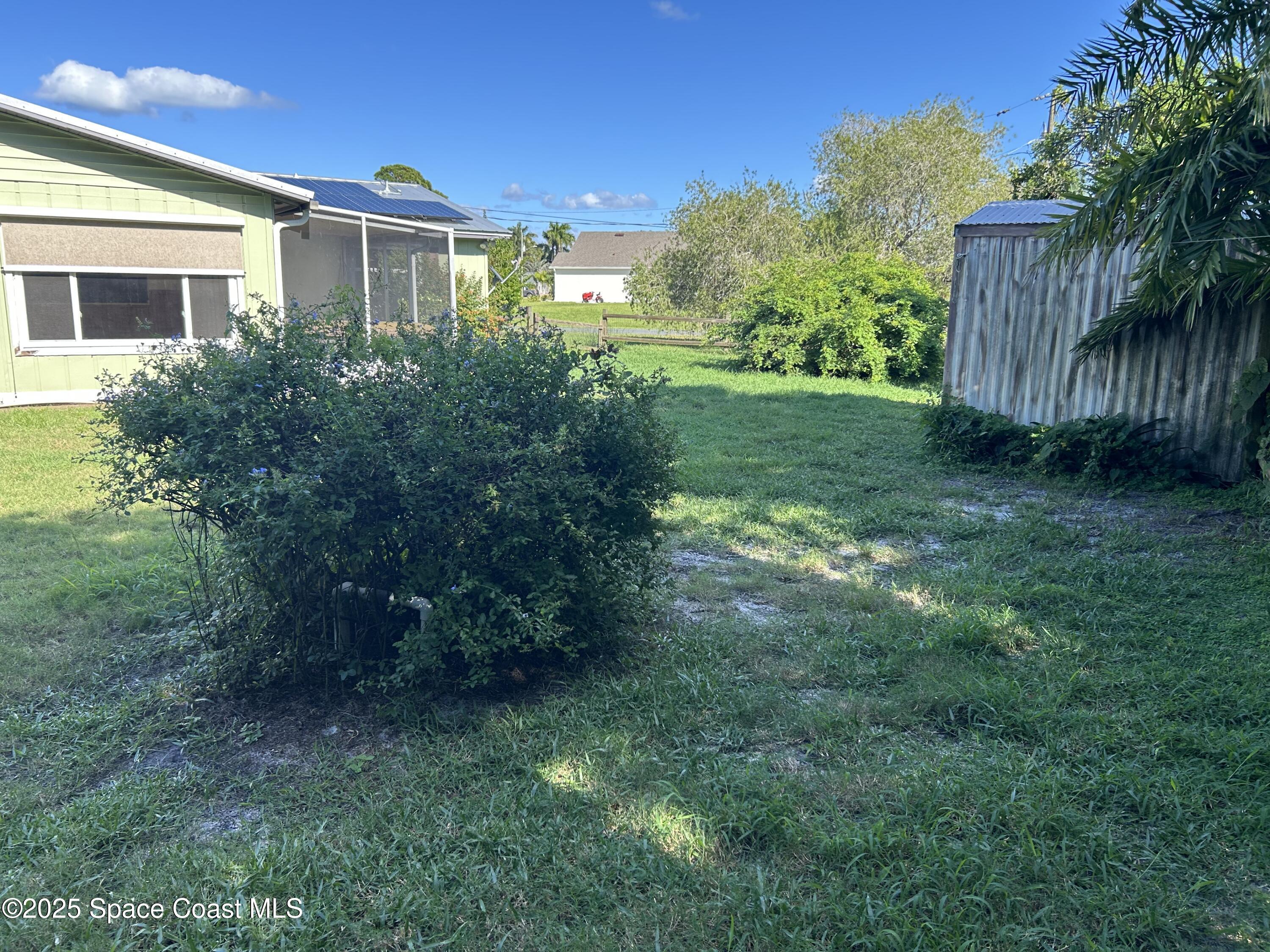 100 South Wimbrow Drive, Unit 15 Sebastian, FL 32958 - Photo 2 of 23 Jan back yard 1
