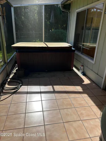 a bathroom with a bathtub and shower