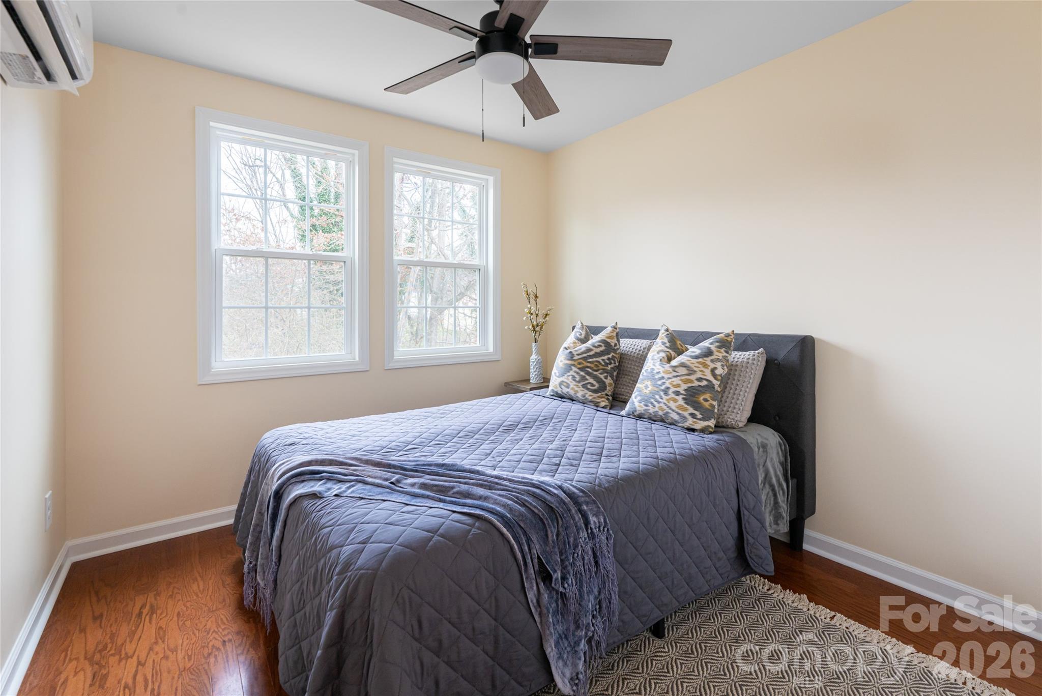 622 North Main Street Canton, NC 28716 - Photo 28 of 36 a bedroom with a bed and window