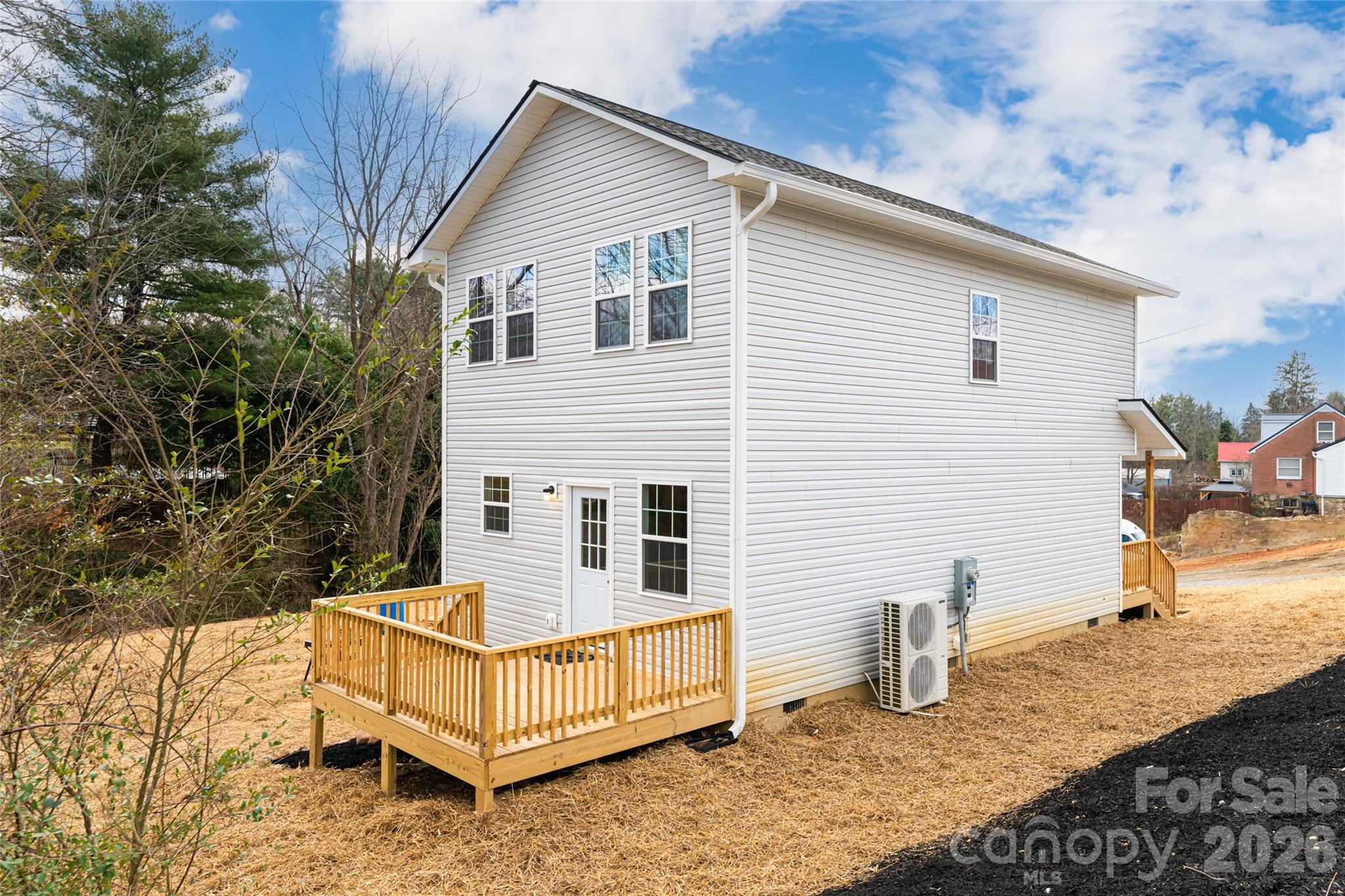 622 North Main Street Canton, NC 28716 - Photo 33 of 36 a view of a house with backyard and sitting area