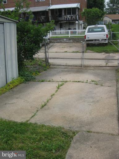 9734 Matzon Road Middle River, MD 21220 - Photo 4 of 12 Exterior (Rear) Parking Pad