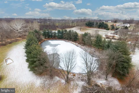 a view of a lake with a yard