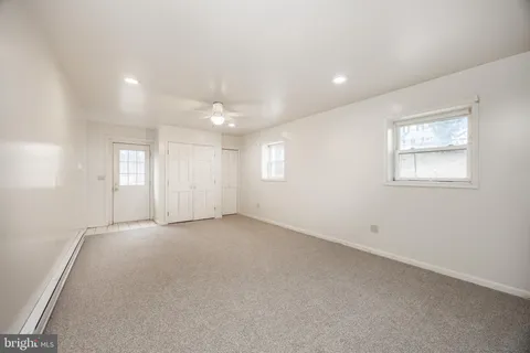 a view of swimming pool from a balcony