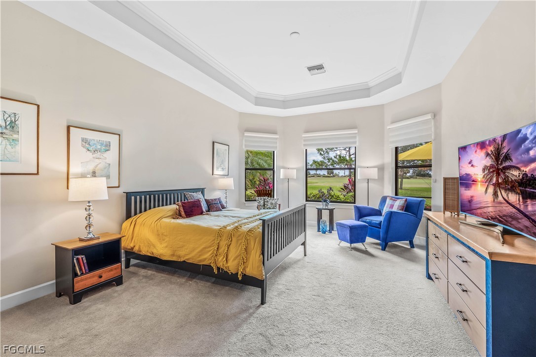3341 Chestnut Grove Drive Alva, FL 33920 - Photo 18 of 44 a bedroom with a bed and a couch