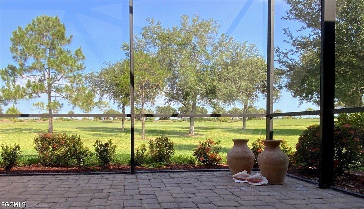 3341 Chestnut Grove Drive Alva, FL 33920 - Photo 26 of 44 a view of a swimming pool with a patio