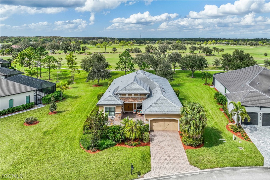 3341 Chestnut Grove Drive Alva, FL 33920 - Photo 30 of 44 a aerial view of a house with big yard