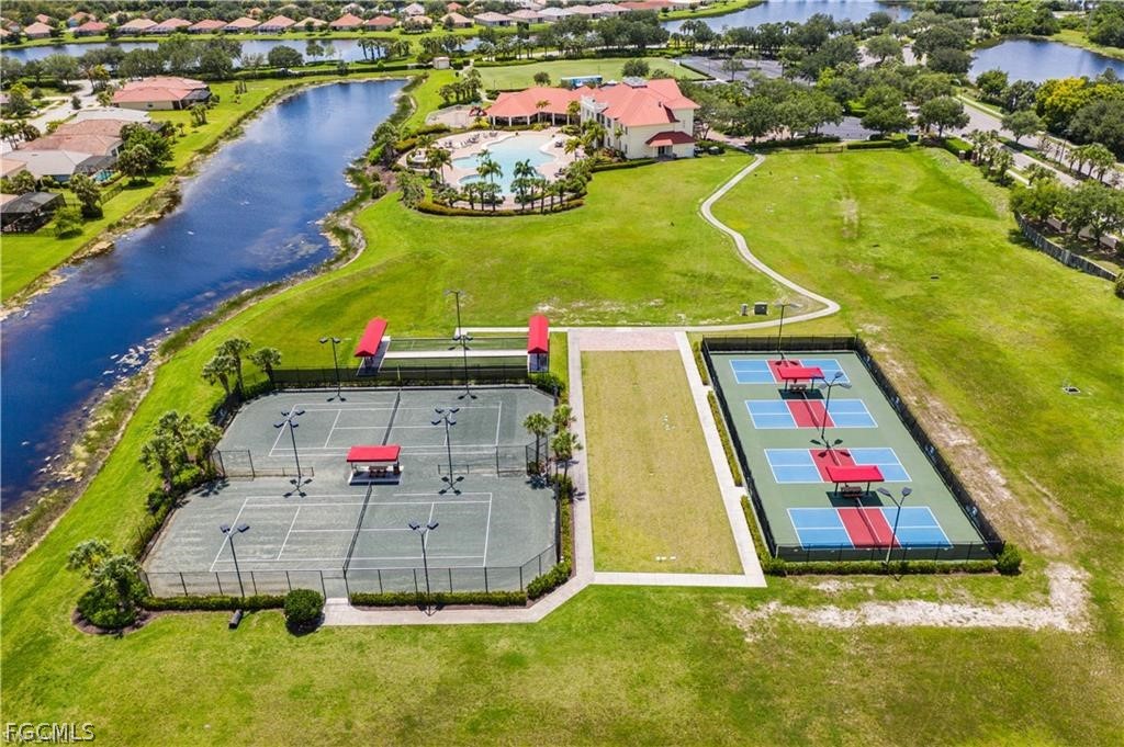 3341 Chestnut Grove Drive Alva, FL 33920 - Photo 42 of 44 an aerial view of residential houses with outdoor space and swimming pool