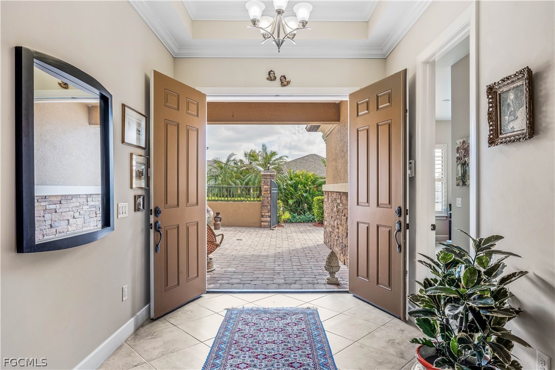 3341 Chestnut Grove Drive Alva, FL 33920 - Photo 8 of 44 a view of a hallway to a livingroom with furniture