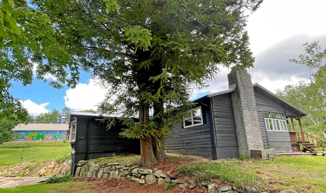 a view of a house with a swimming pool