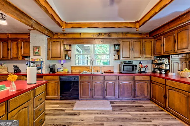 a balcony view with a hardwood floor