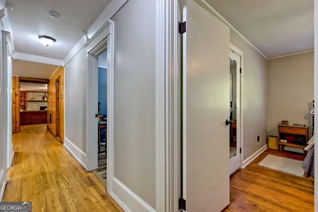 a balcony view with a hardwood floor