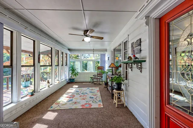 a kitchen with stainless steel appliances granite countertop a stove and a wooden floors