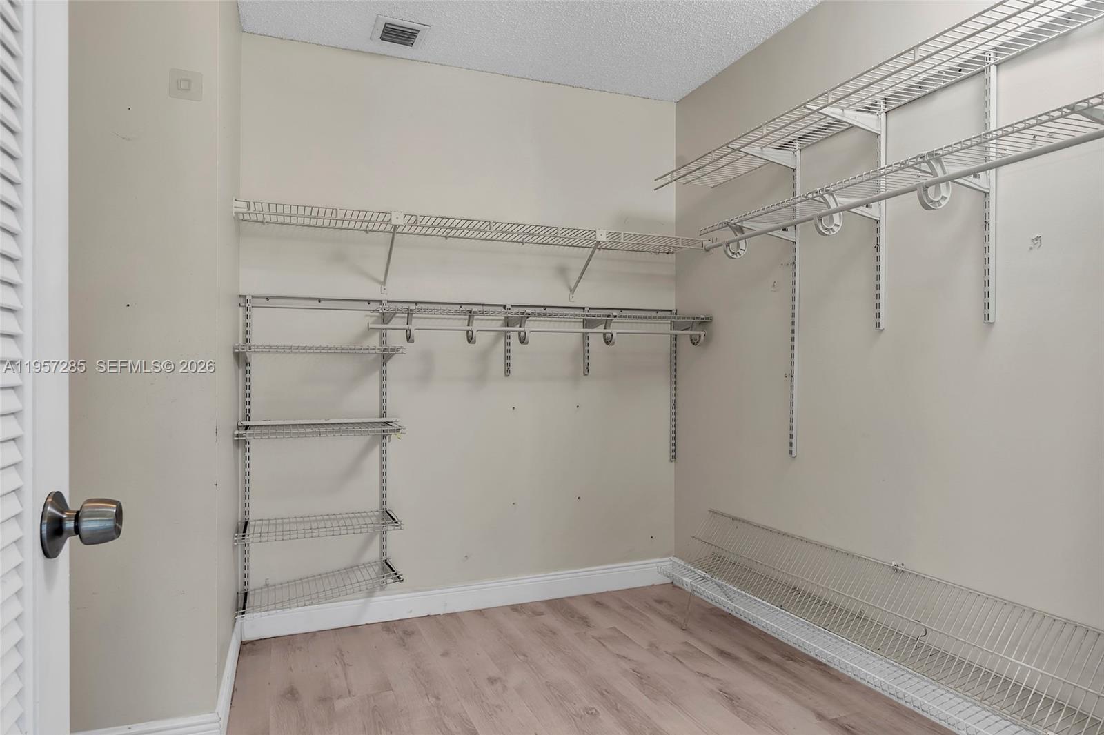 6768 Canary Palm Circle Boca Raton, FL 33433 - Photo 34 of 39 a view of a room with racks on the wall