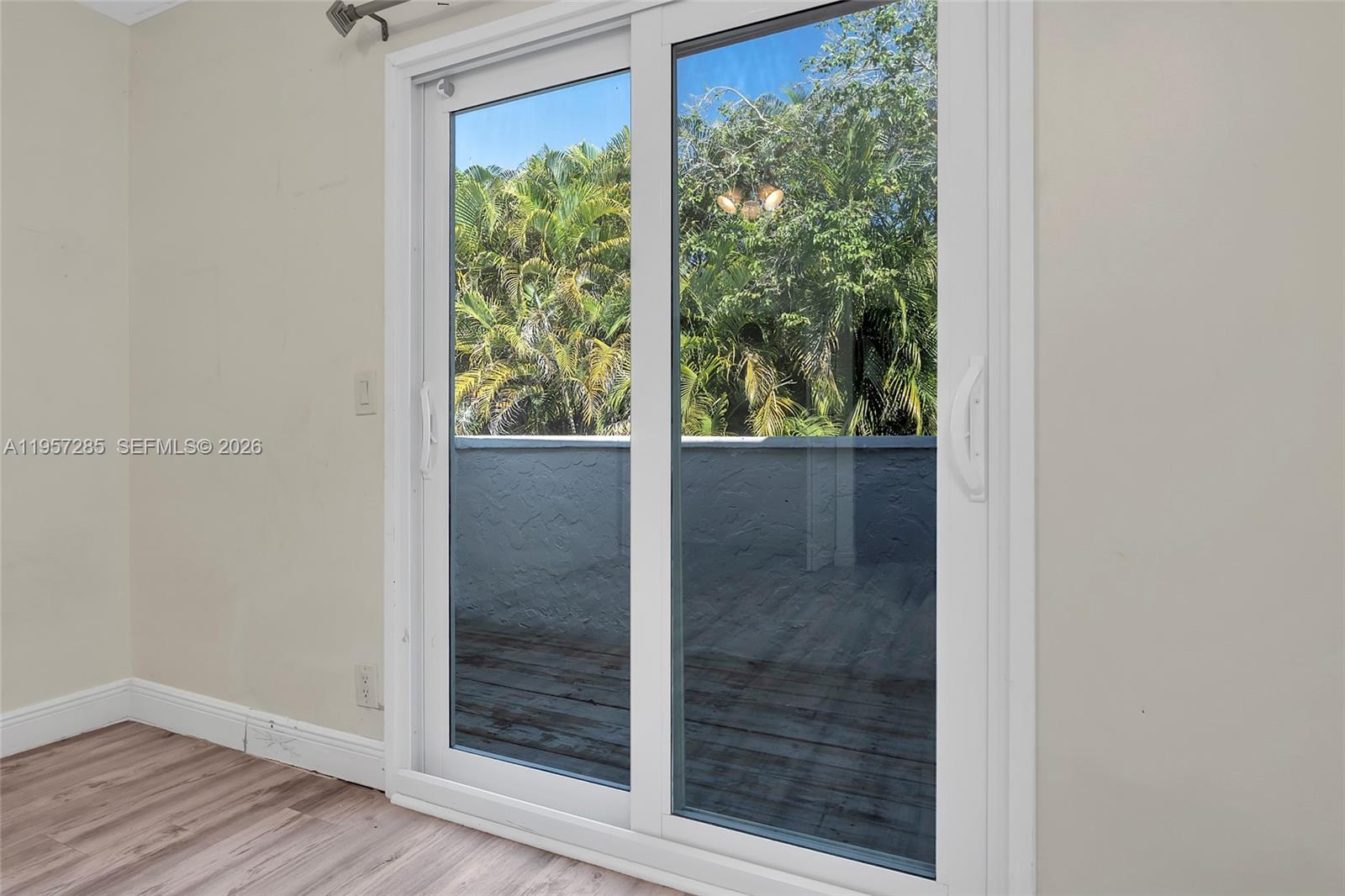 6768 Canary Palm Circle Boca Raton, FL 33433 - Photo 36 of 39 a view of a glass door with a glass door