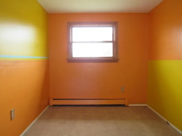 an empty room with a window