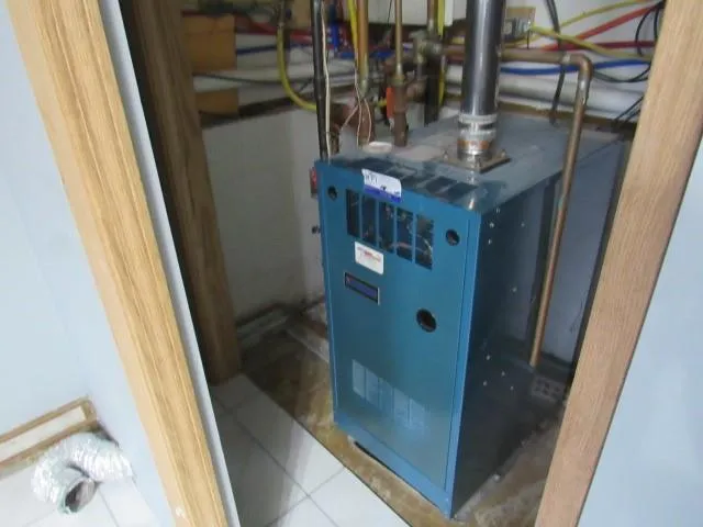 a bathroom with a granite countertop shower and a sink