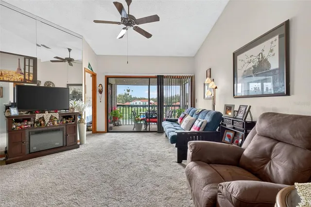 a bedroom with bed and a chandelier